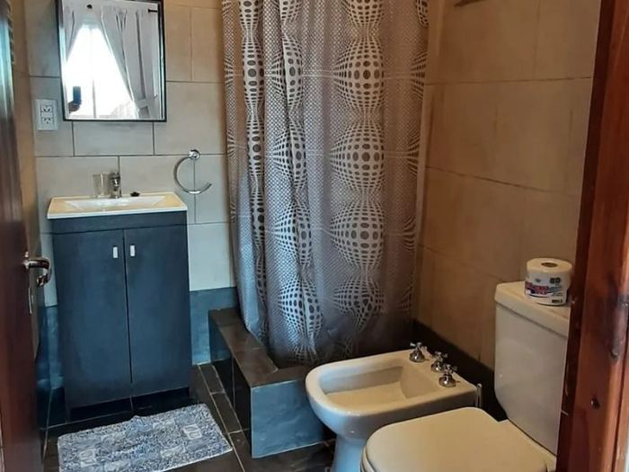 Baño completo de Antú