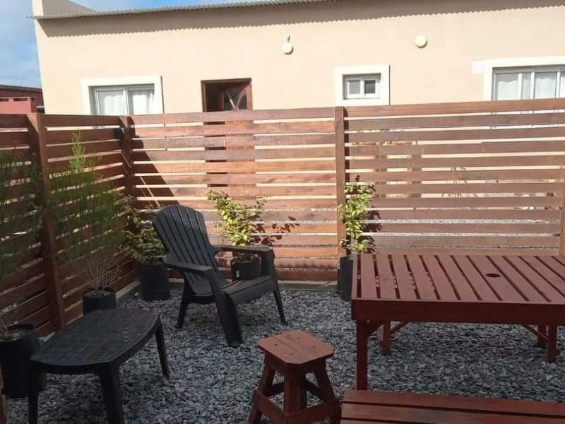 Patio con deck de la cabaña Antú