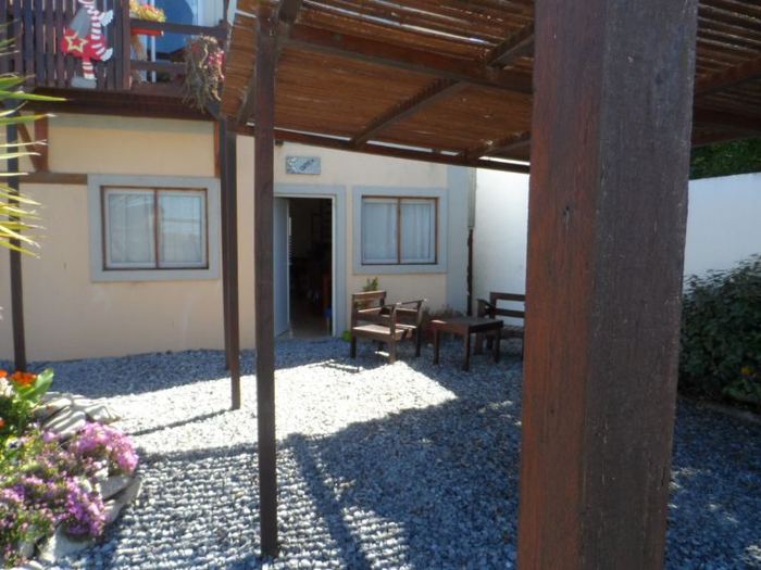 Patio con pérgola de Cuyen