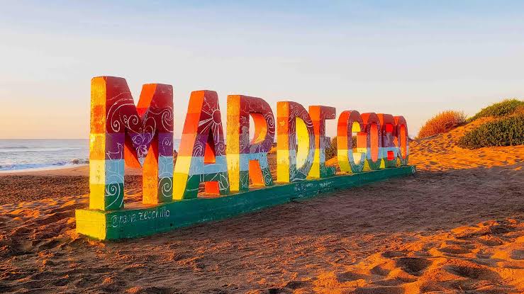 Cartel de Mar de Cobo con el mar de fondo